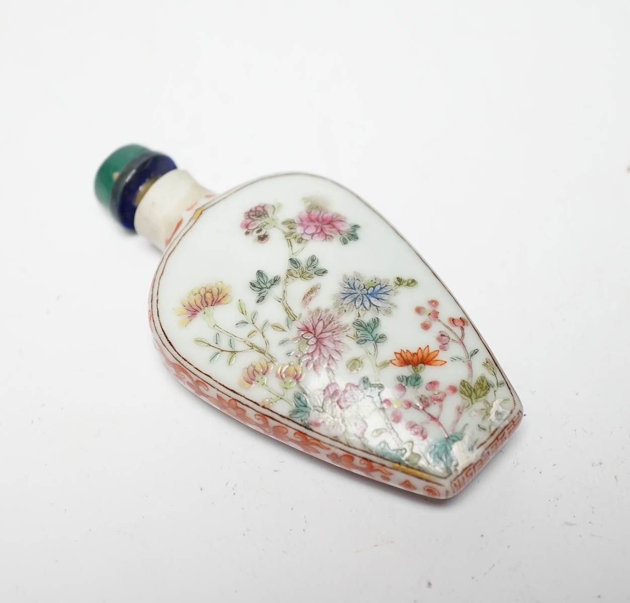 A Chinese famille rose snuff bottle, Jiaqing mark and of the period (1796-1820), rim ground off, 7cm high